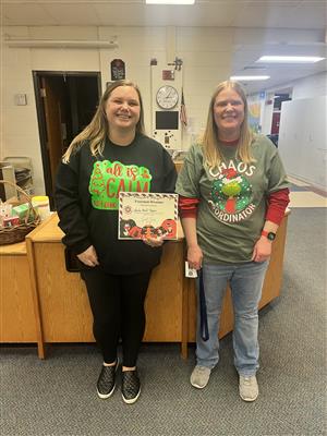 CES Staff Festive Sweaters 2024 3.jpg